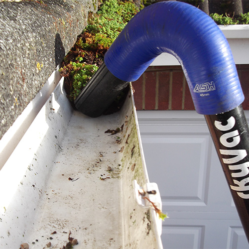 SkyVac Cleaning Gutters